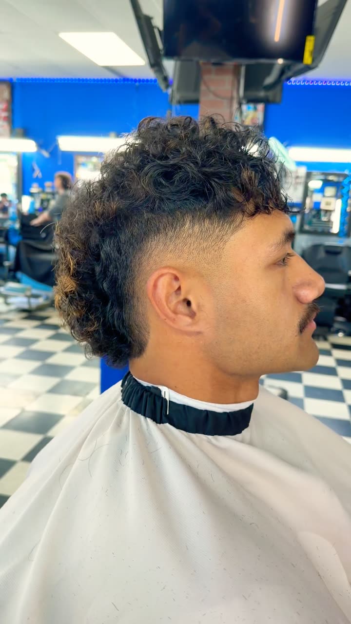 Burst fade with a curly top